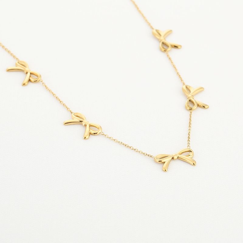 Gouden grotere strik ketting