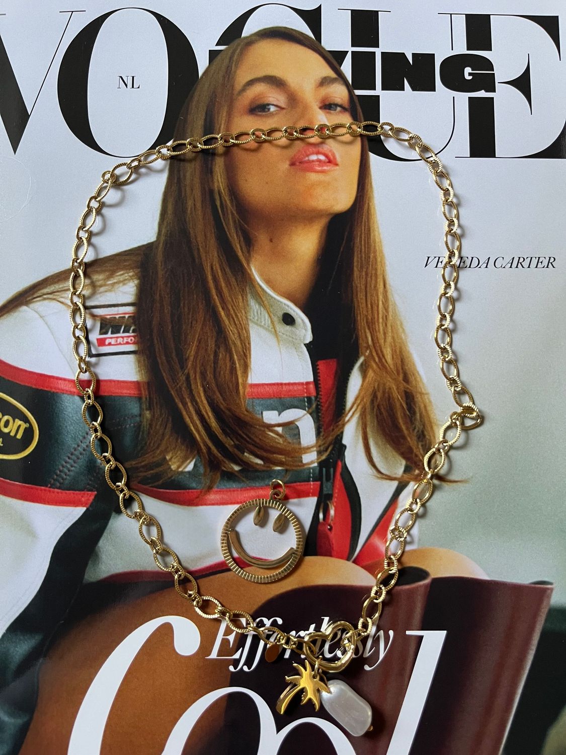 Gouden schakel ketting met extra losse smiley bedel