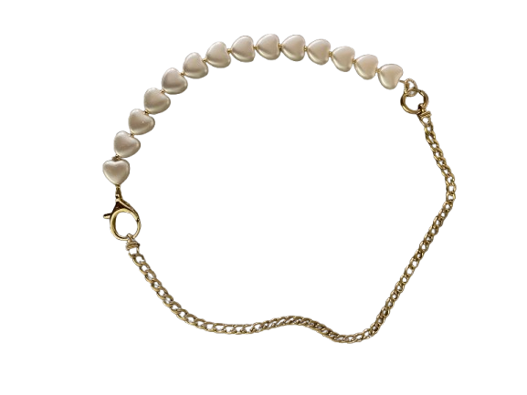 Gouden schakel met hartjes parel