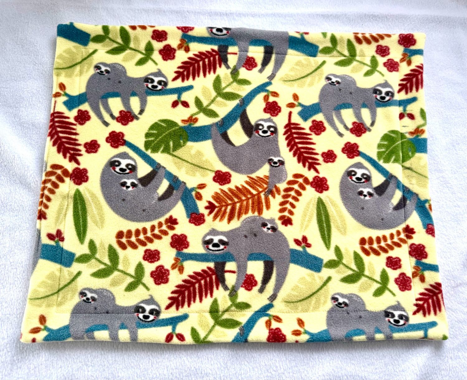 Pipipad Faultiere pastell gelb 40x50