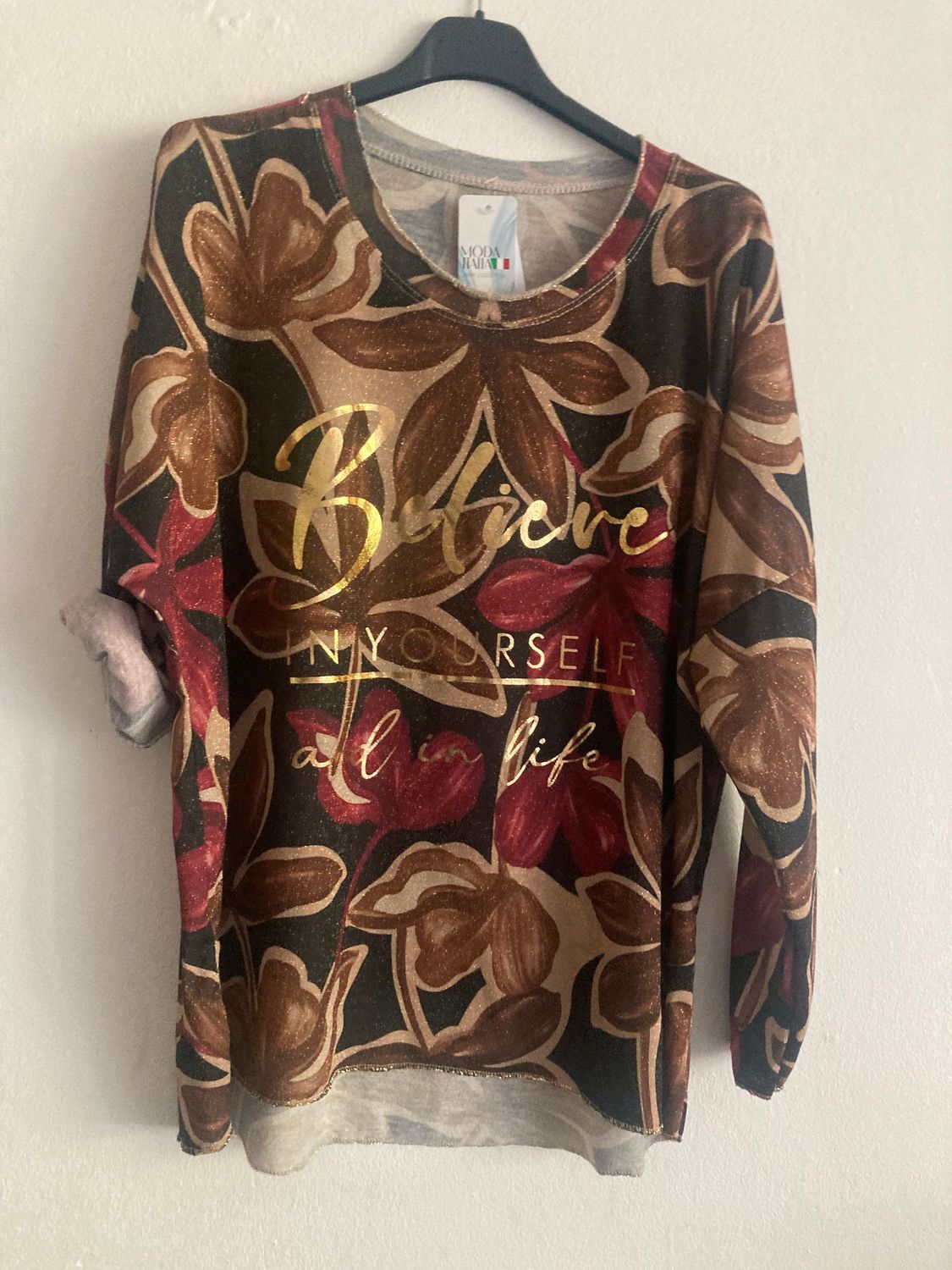 Shirt  Die Qualität: 85% Polyester 15% Lurex