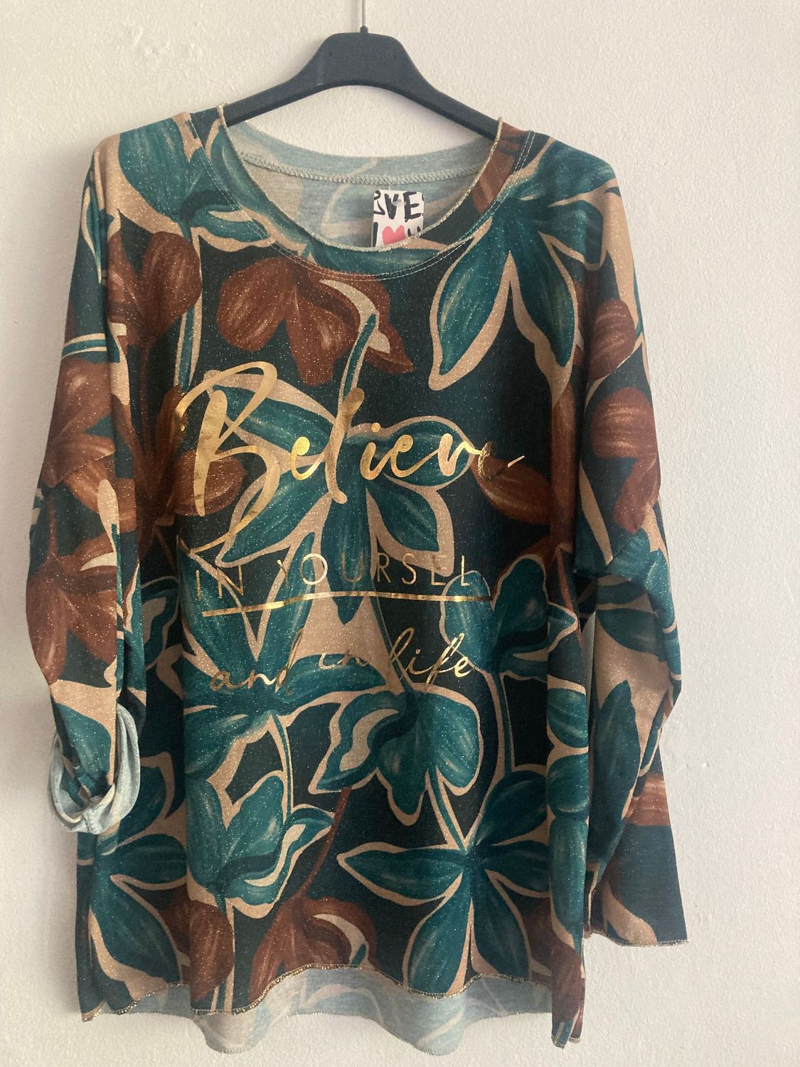 Shirt   Die Qualität: 85% Polyester 15% Lurex v