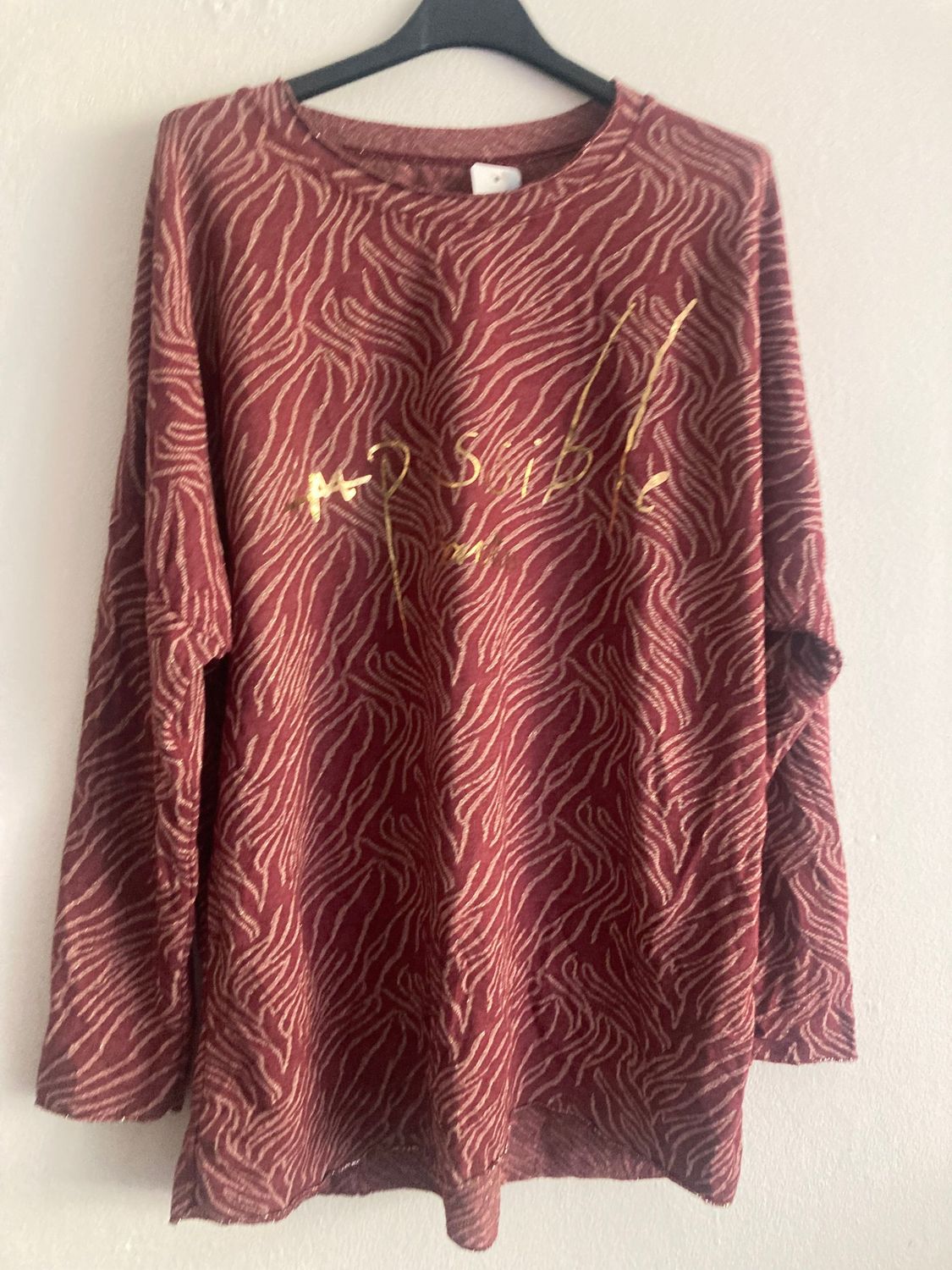 Shirt Die Qualität   45% Polyester  35% Viskose  15% Lurex 5% Elastic