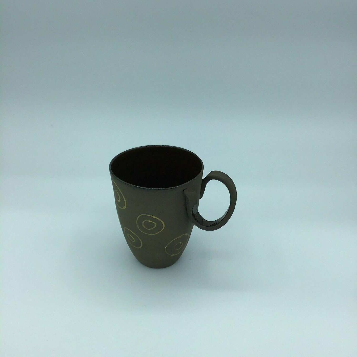 Tazas negras.  10 cm x 7 cm.