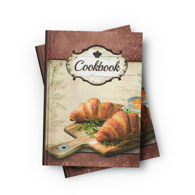 Oppskriftsbok med kj�leskapsmagnet Croisaint