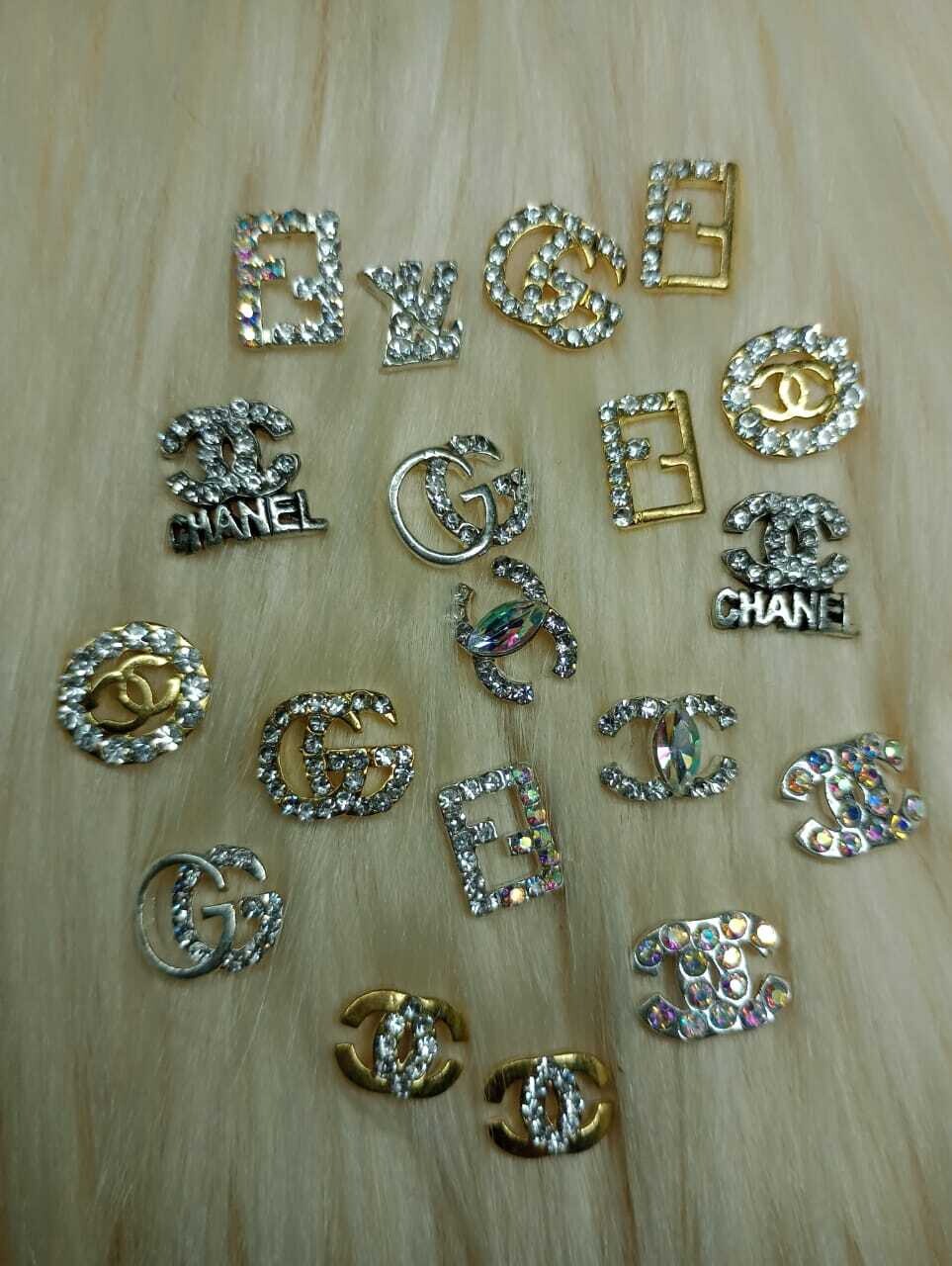 Apliques para uñas Marcas (el par)