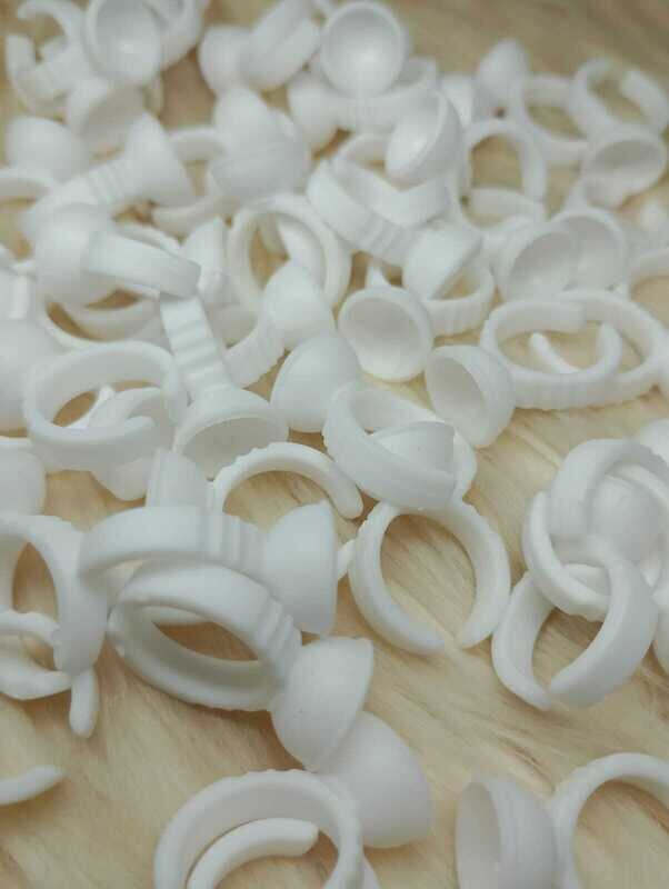 Anillitos blancos para pegamento de pestañas x Uni.