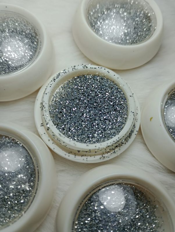 Polvo Glitter Plateado pata Uñas