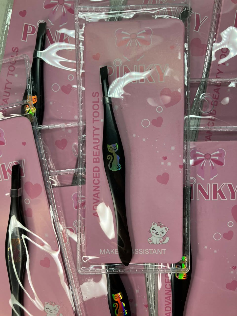 Pinza Pinky para cejas (gato)