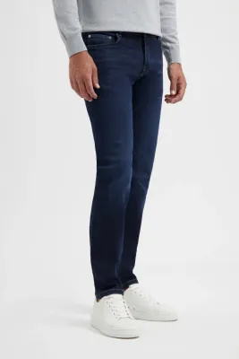 North84 dark blue jeans 84301002-415 on a model, side view with white trainers at Van den Broek Herenmode