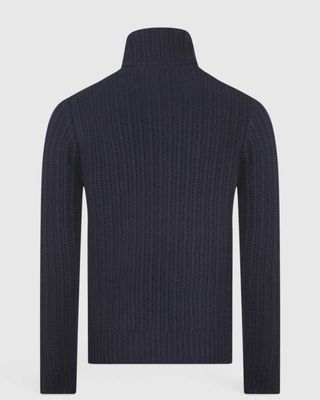 Achterkant van het donkerblauwe Gran Sasso vest met fijn parelbreisel.