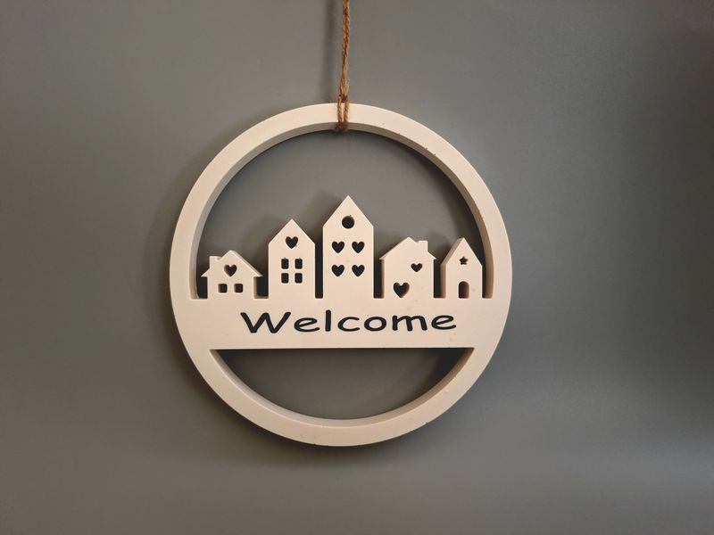 Ring mit Häusern "Welcome"