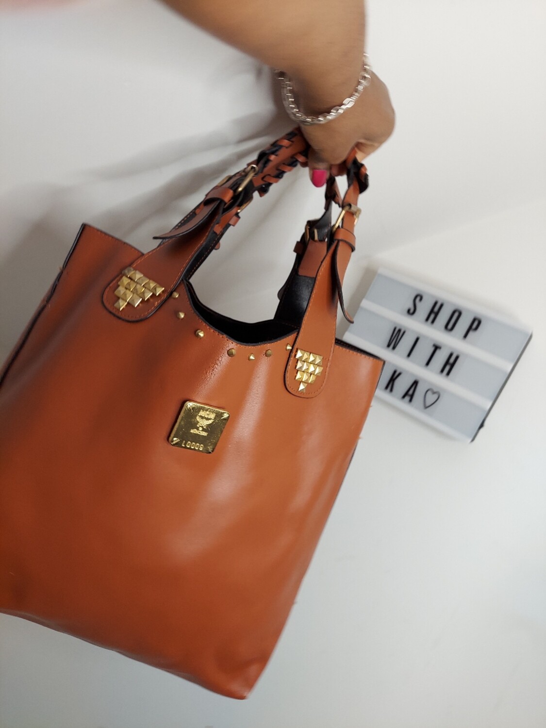 Used camel tote bag