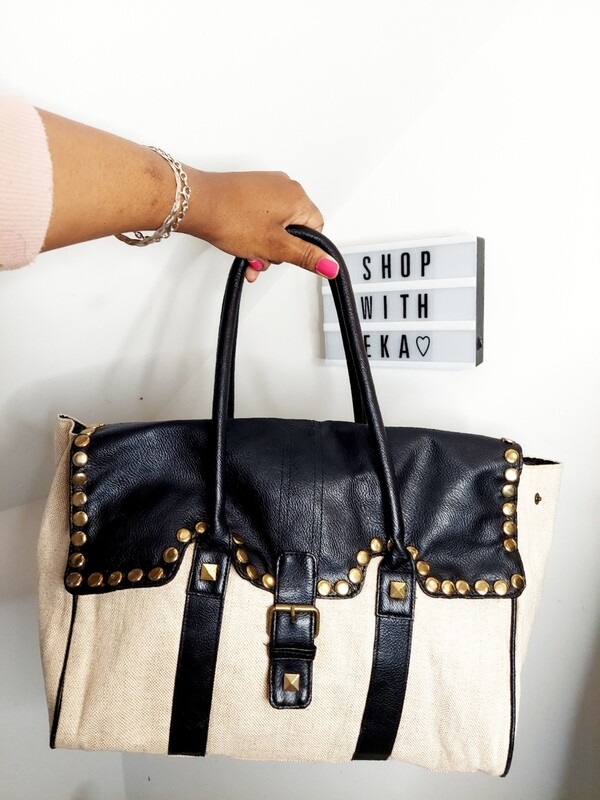 Used cream and black handbag with gold detailing