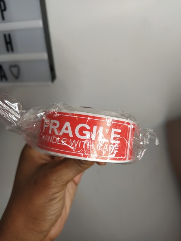 Roll of 100 red fragile stickers (ADD ON ITEM)