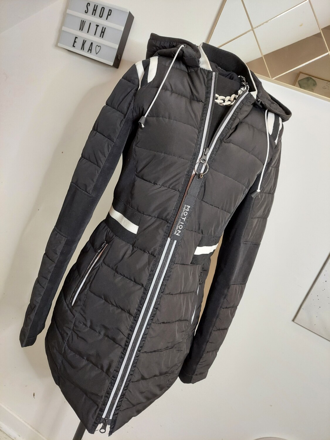 Used black and white jacket