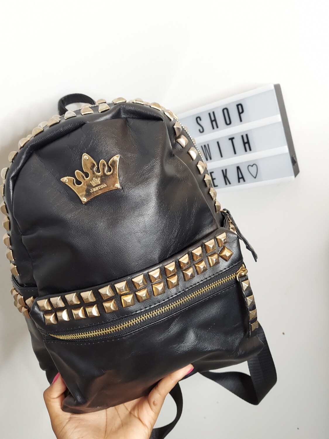 Used faux leather black backpack