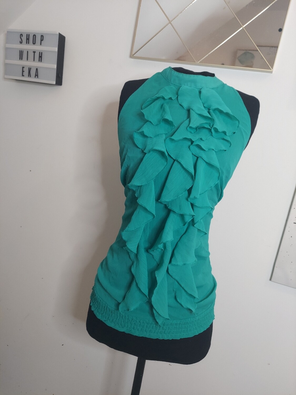 Used teal sleeveless top