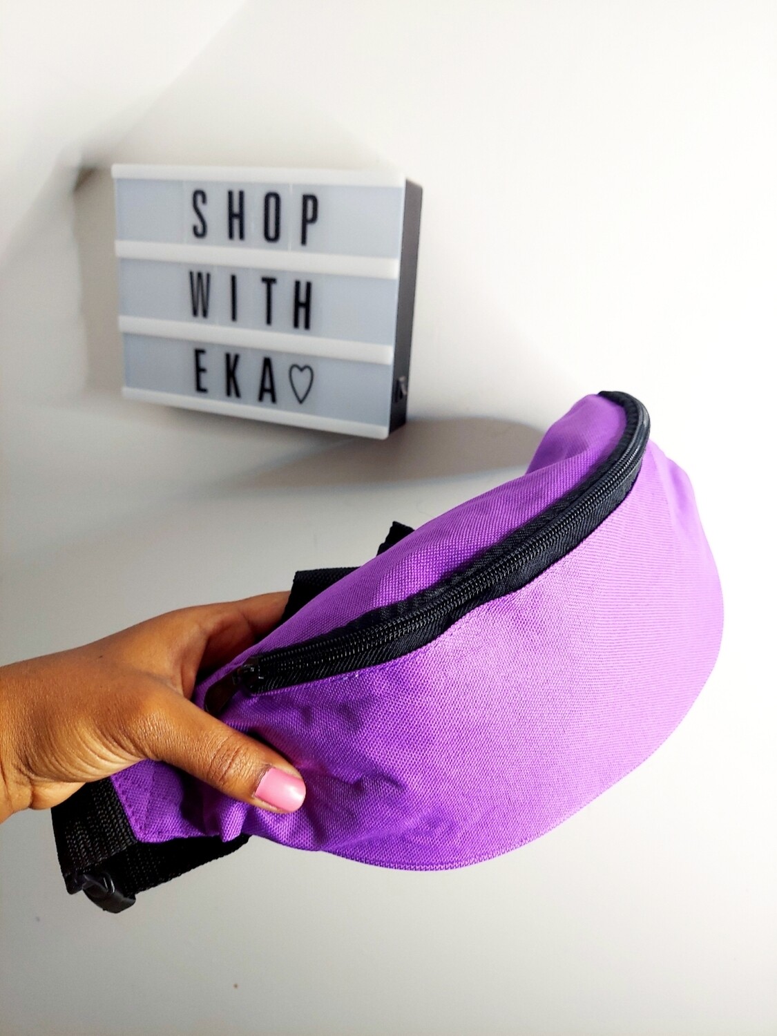 Used purple fanny pack