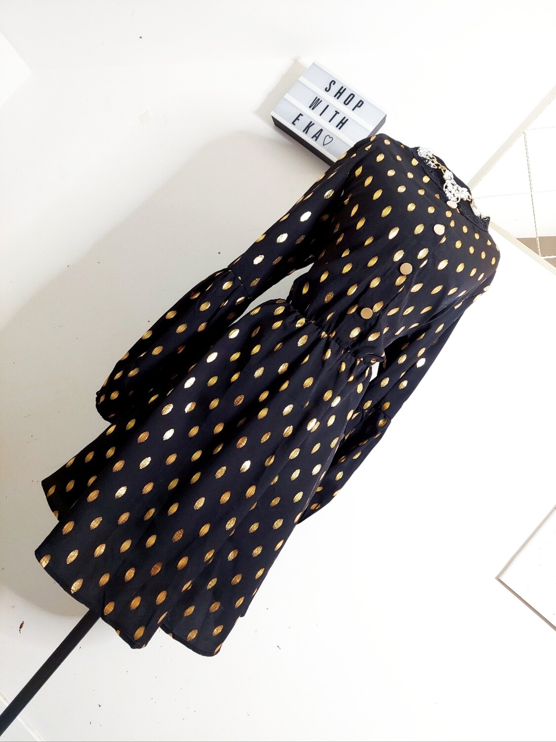 used black and gold polkadot dress