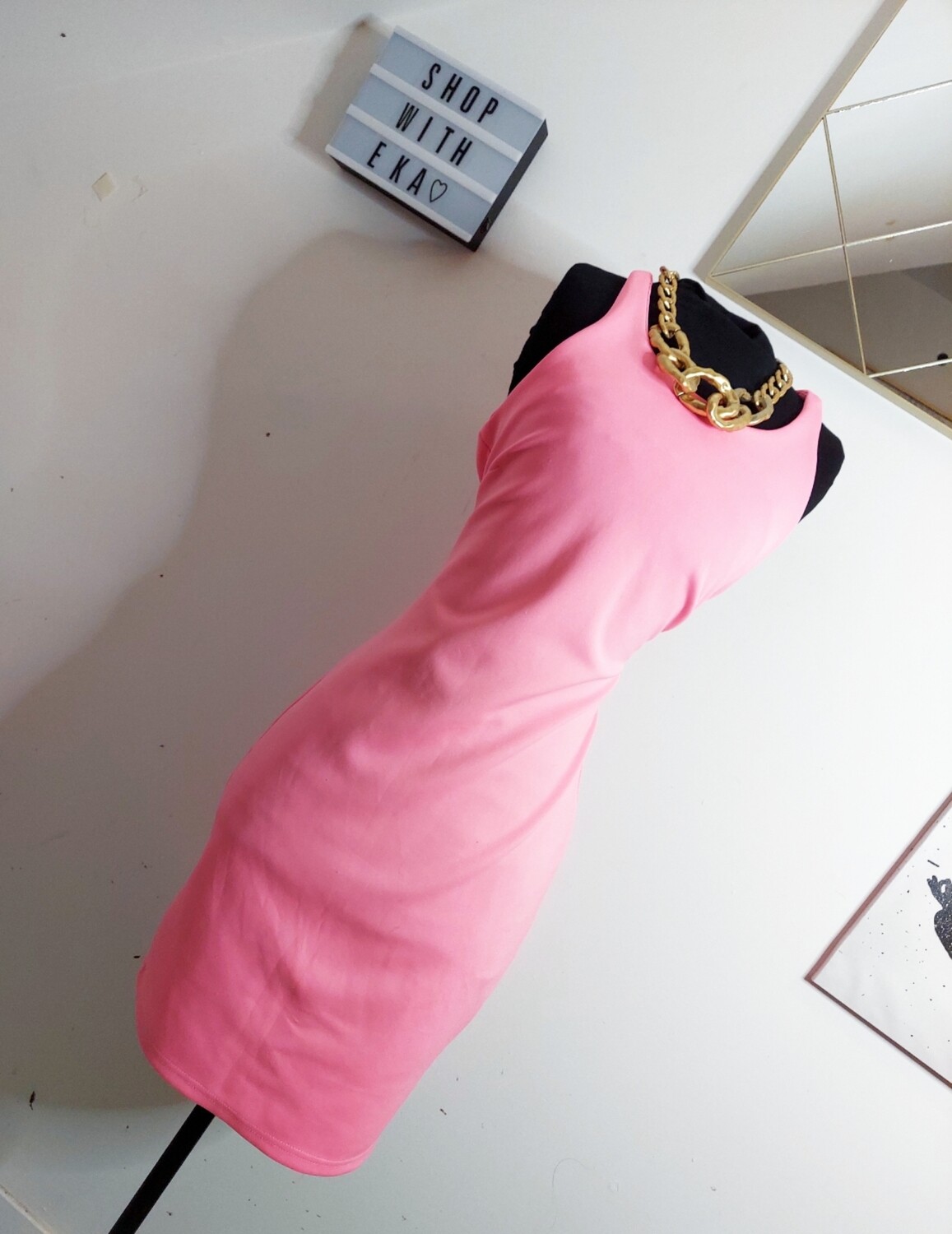 used pink sleeveless dress