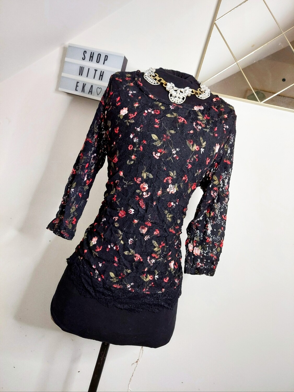 used long-sleeved floral lace-like top