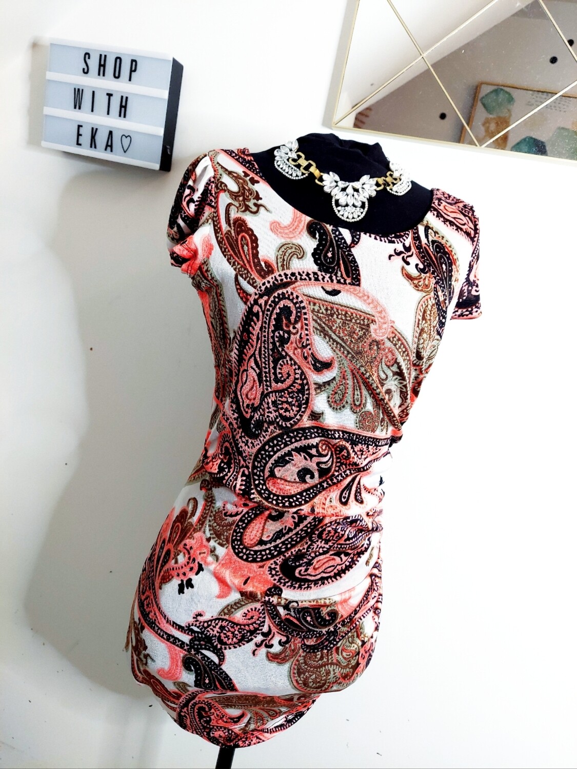 used white dress with pink paisley print