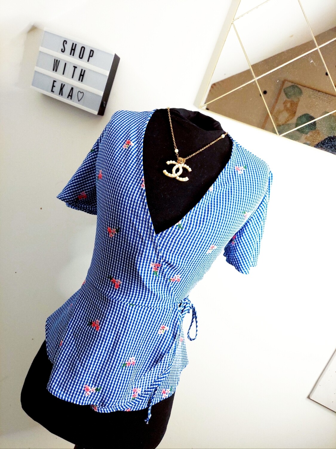 used blue floral crop wrap top