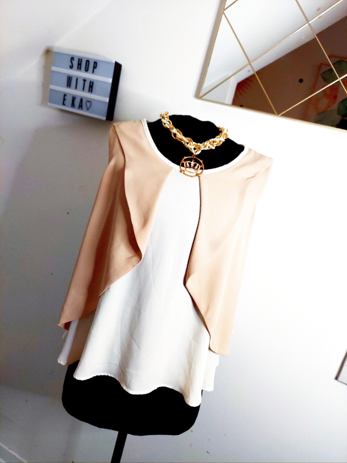 used white and cream sleeveless top