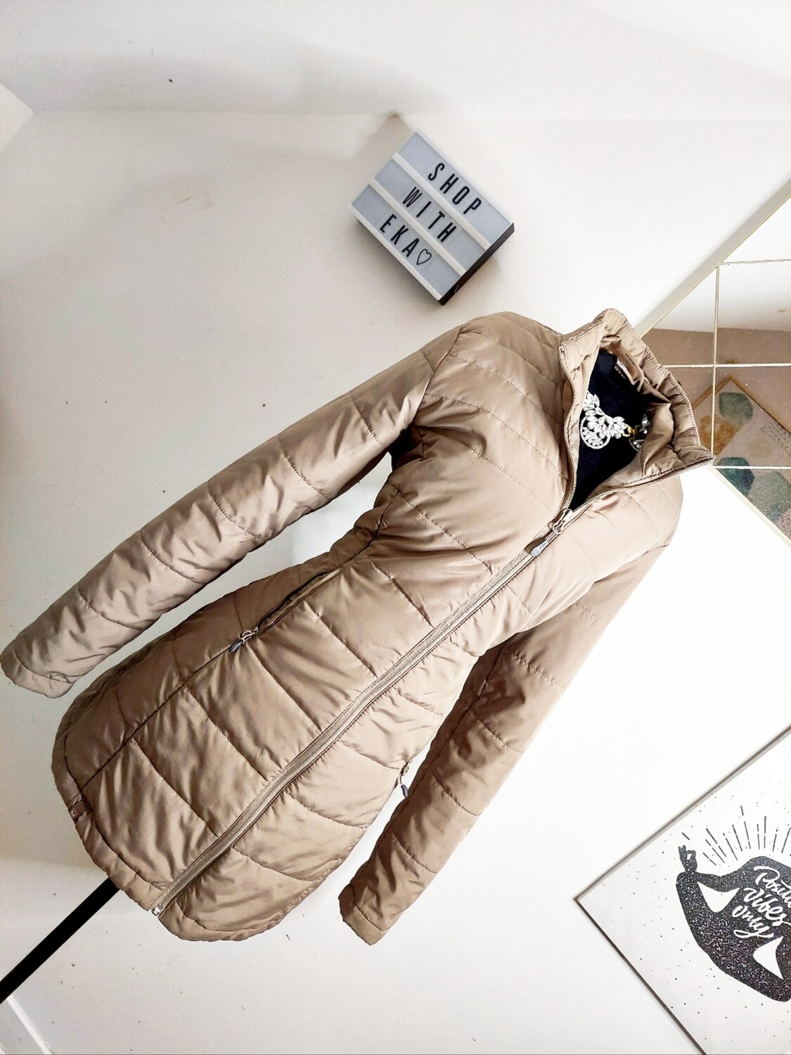 used beige long puffy jacket