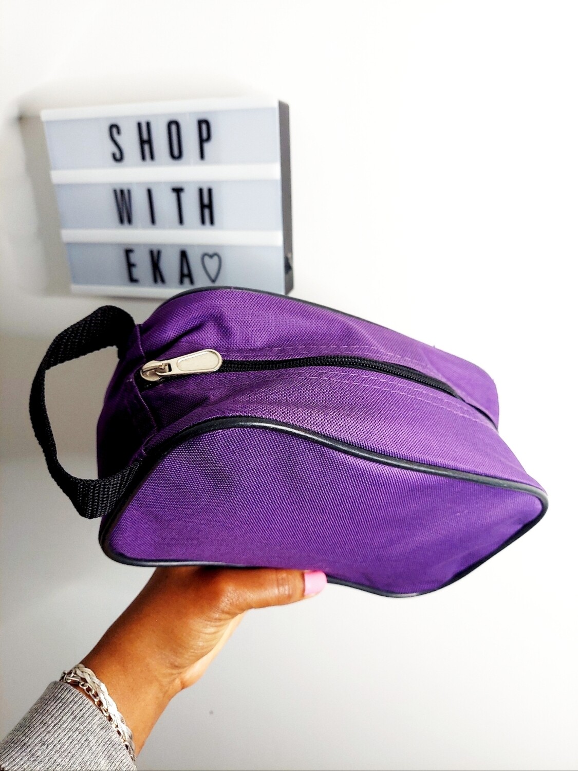 used purple cosmetic or pencil case with handle