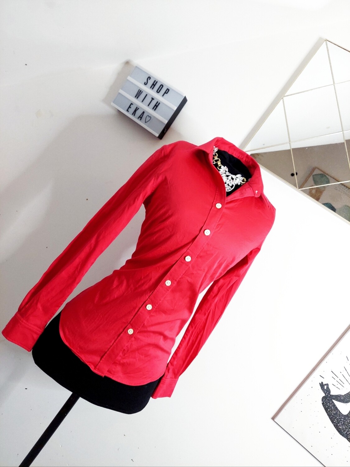 used red button up long-sleeved shirt