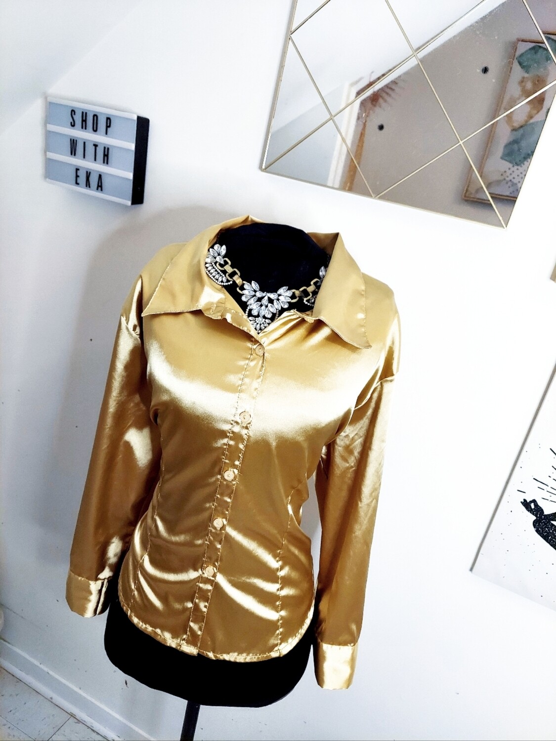 used gold button up long-sleeved blouse