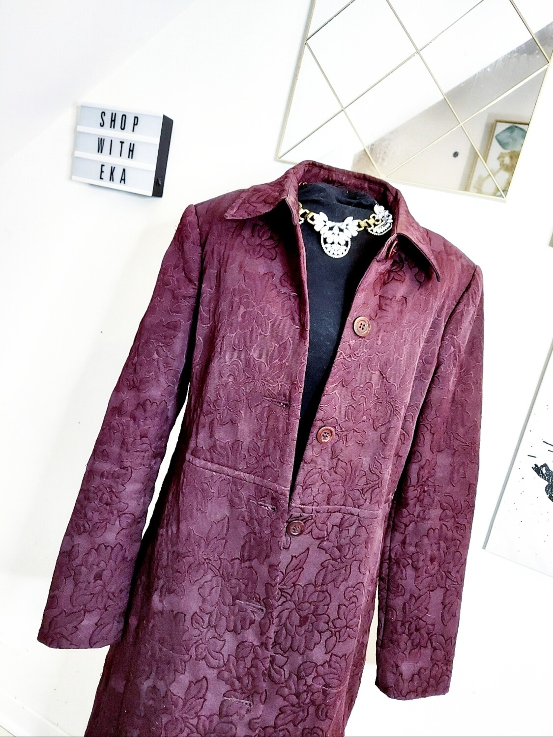 Used burgundy pea coat with floral pattern