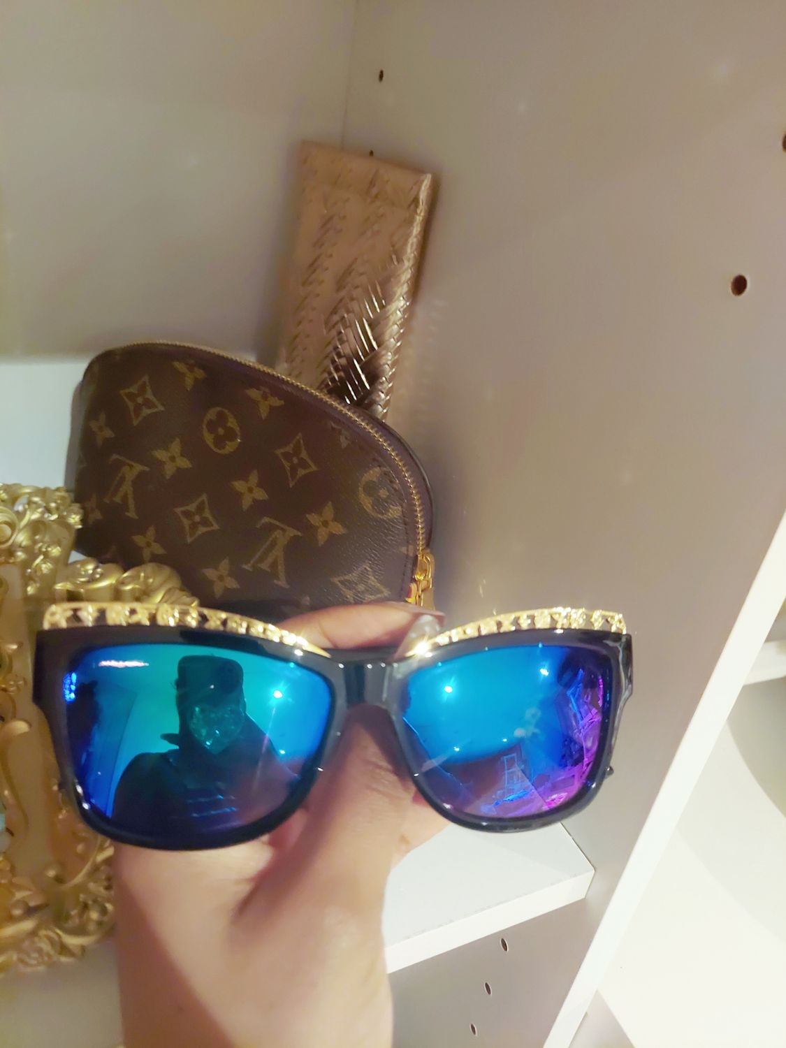 Black sunglasses with iridescent lenses