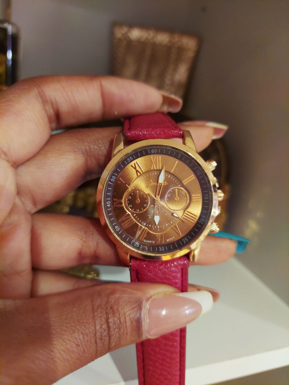 Burgundy rose gold watch