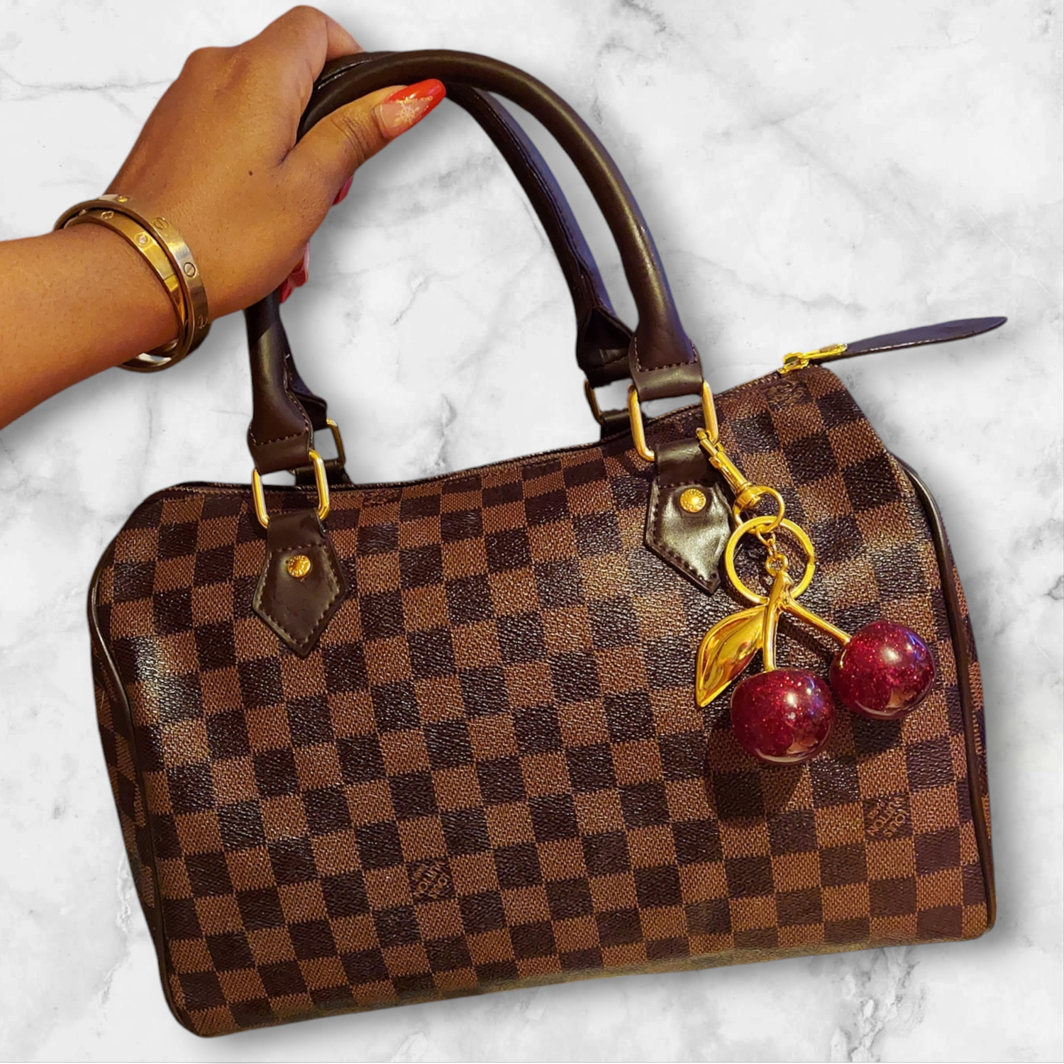 Checkered bag with cherry charm