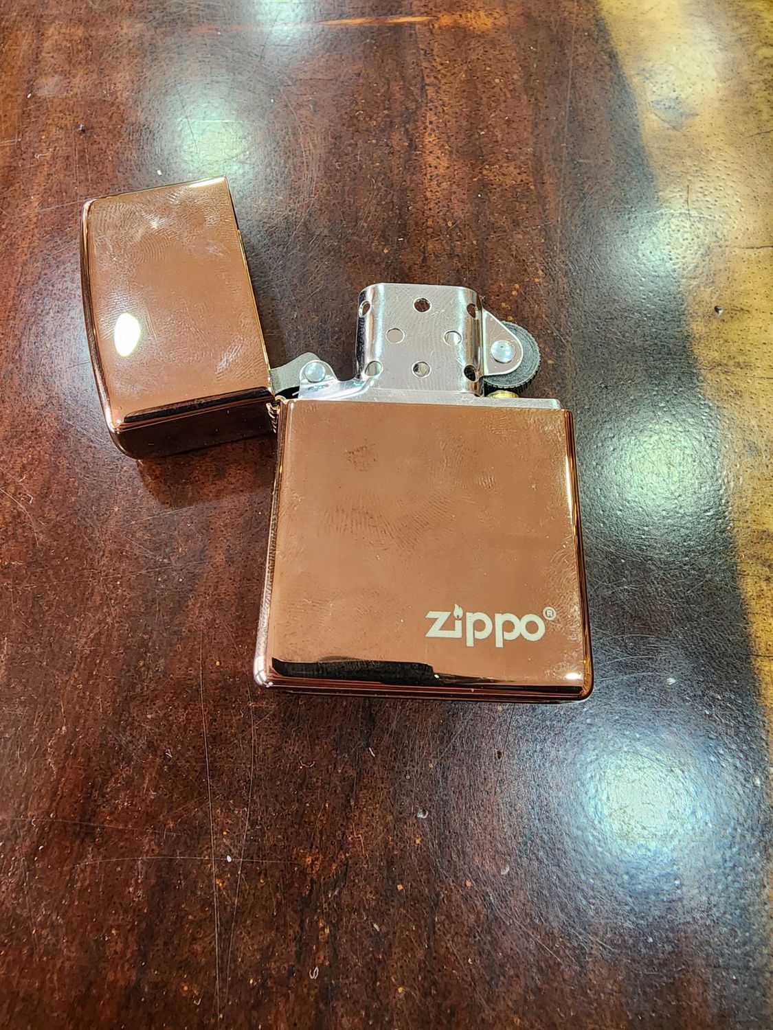 Rose Gold Zippo Logo
