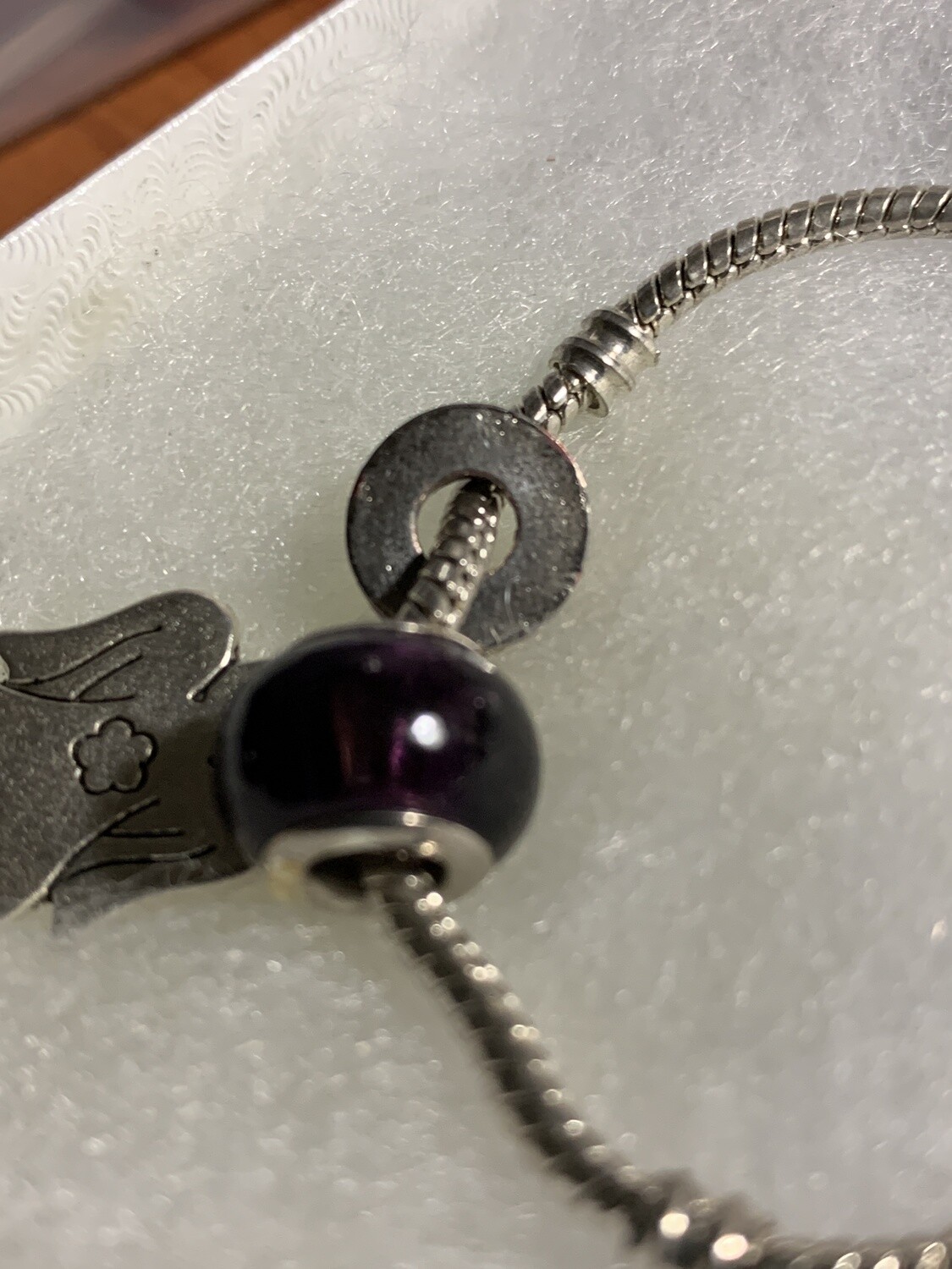 beautiful bracelet with Multiple Sterling Silver And Wavy Glass Charm Beads