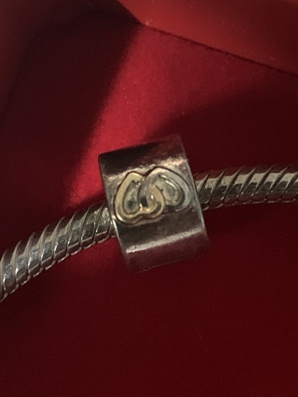 Pandora charm bracelet with love charm and love ball charm sterling silver .925. clasp has double heart imprinted classic pandora Bracelet