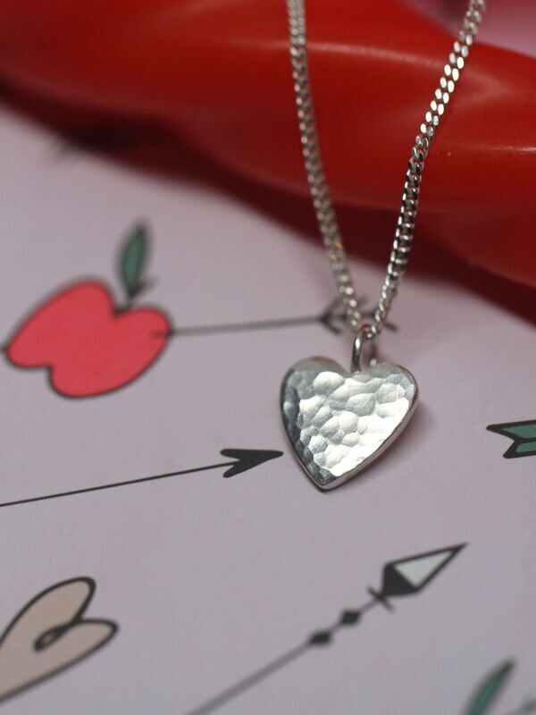 PUNCHED HEART