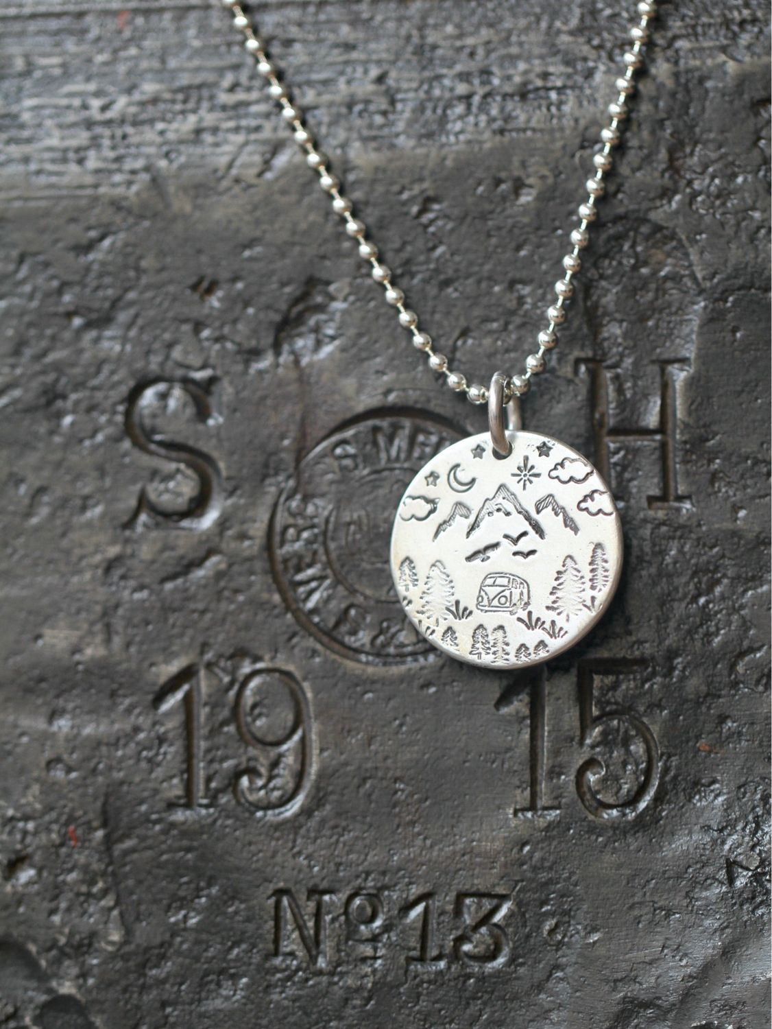 PUNCHED PIC necklace