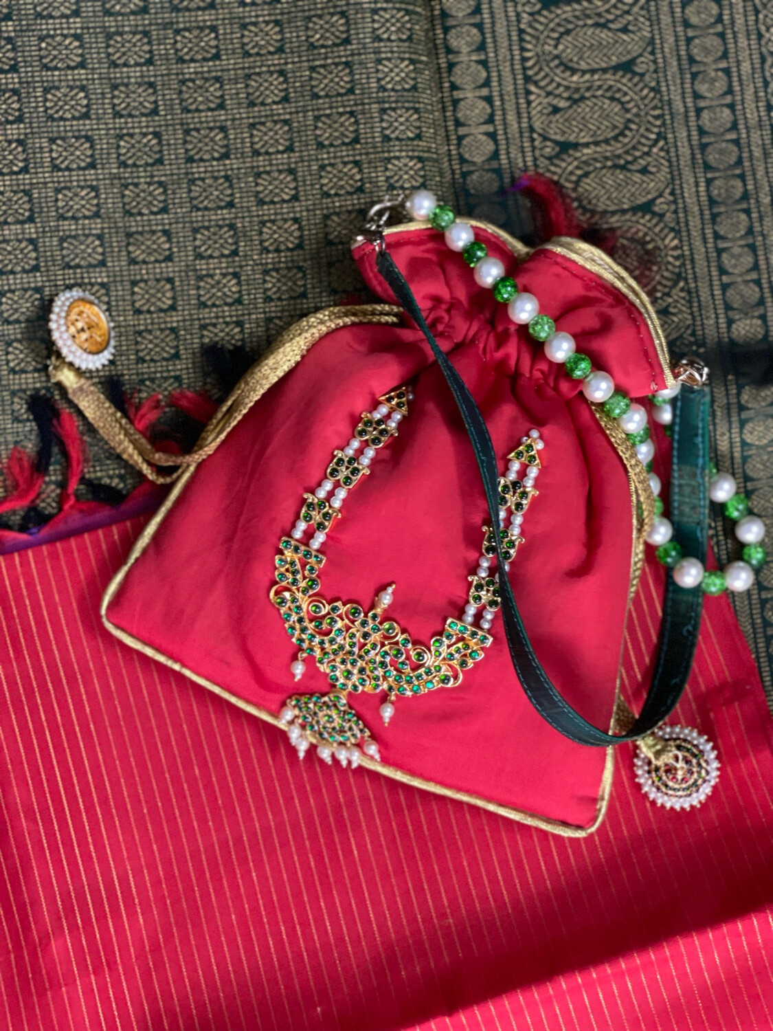 Red Potli And Green Haram