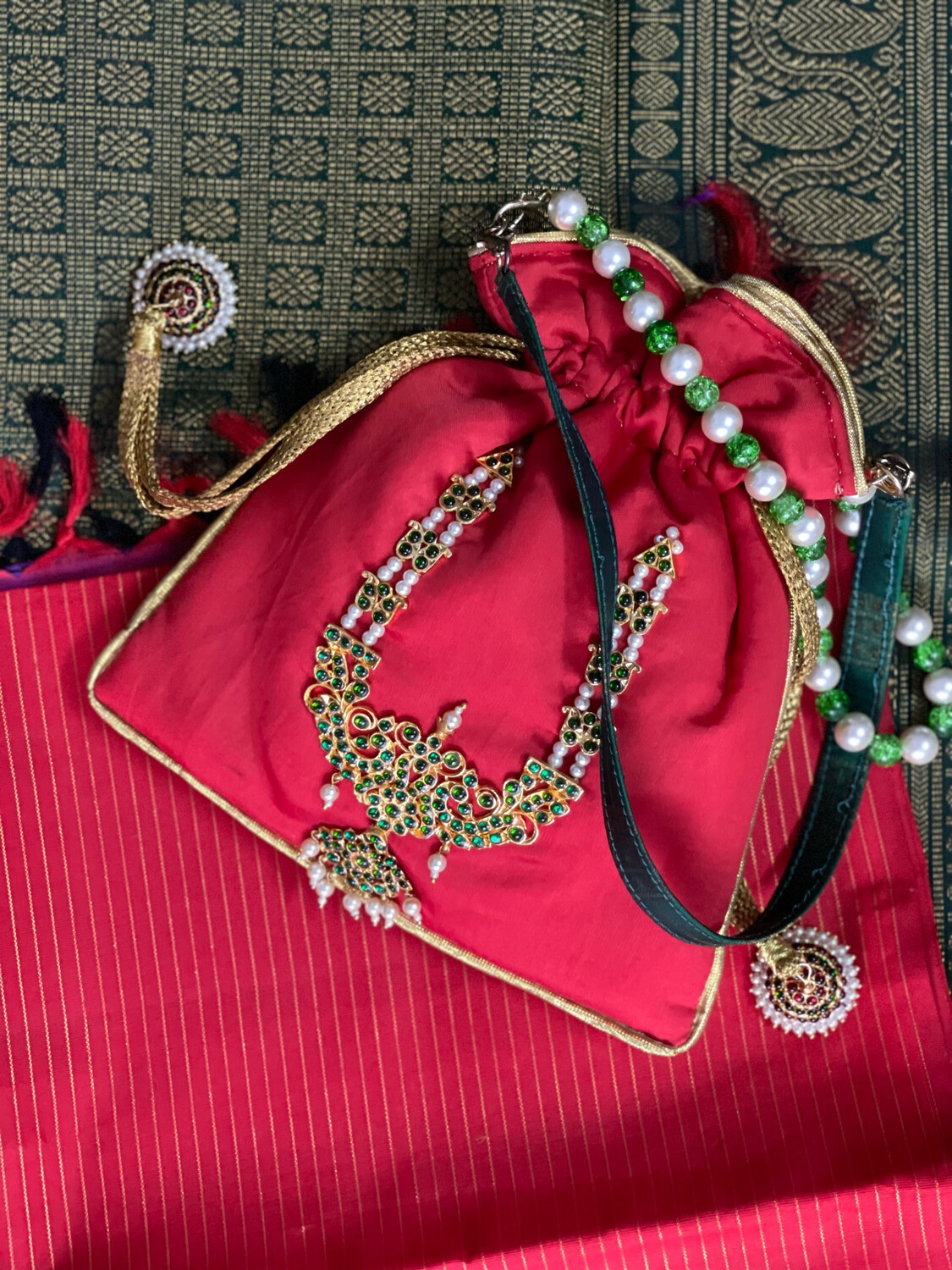 Red Potli And Green Haram