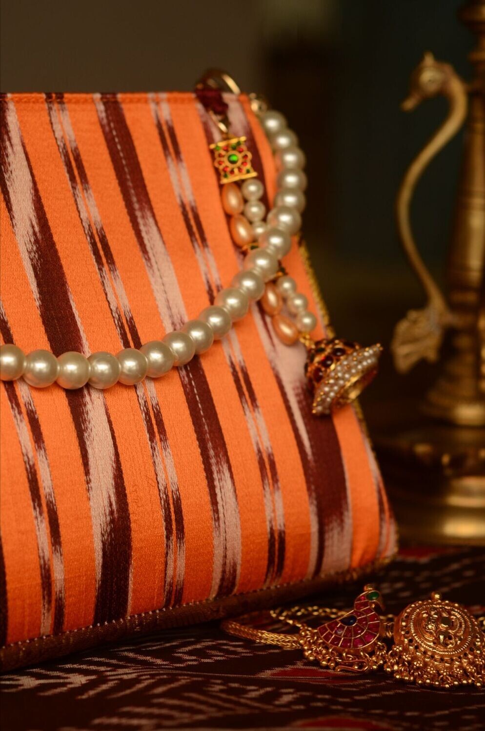 Kanakambara Handbag