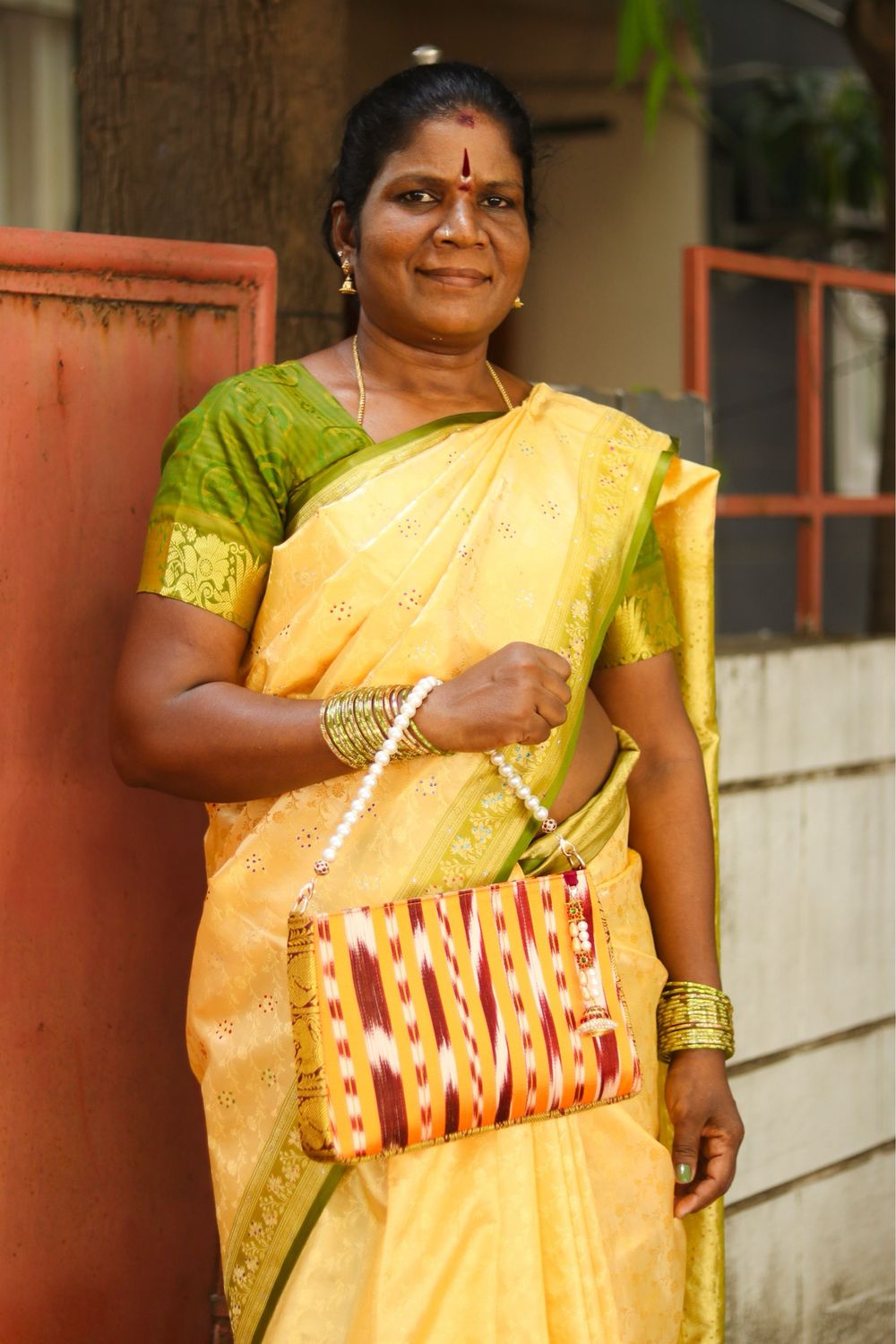 Kanakambara Handbag