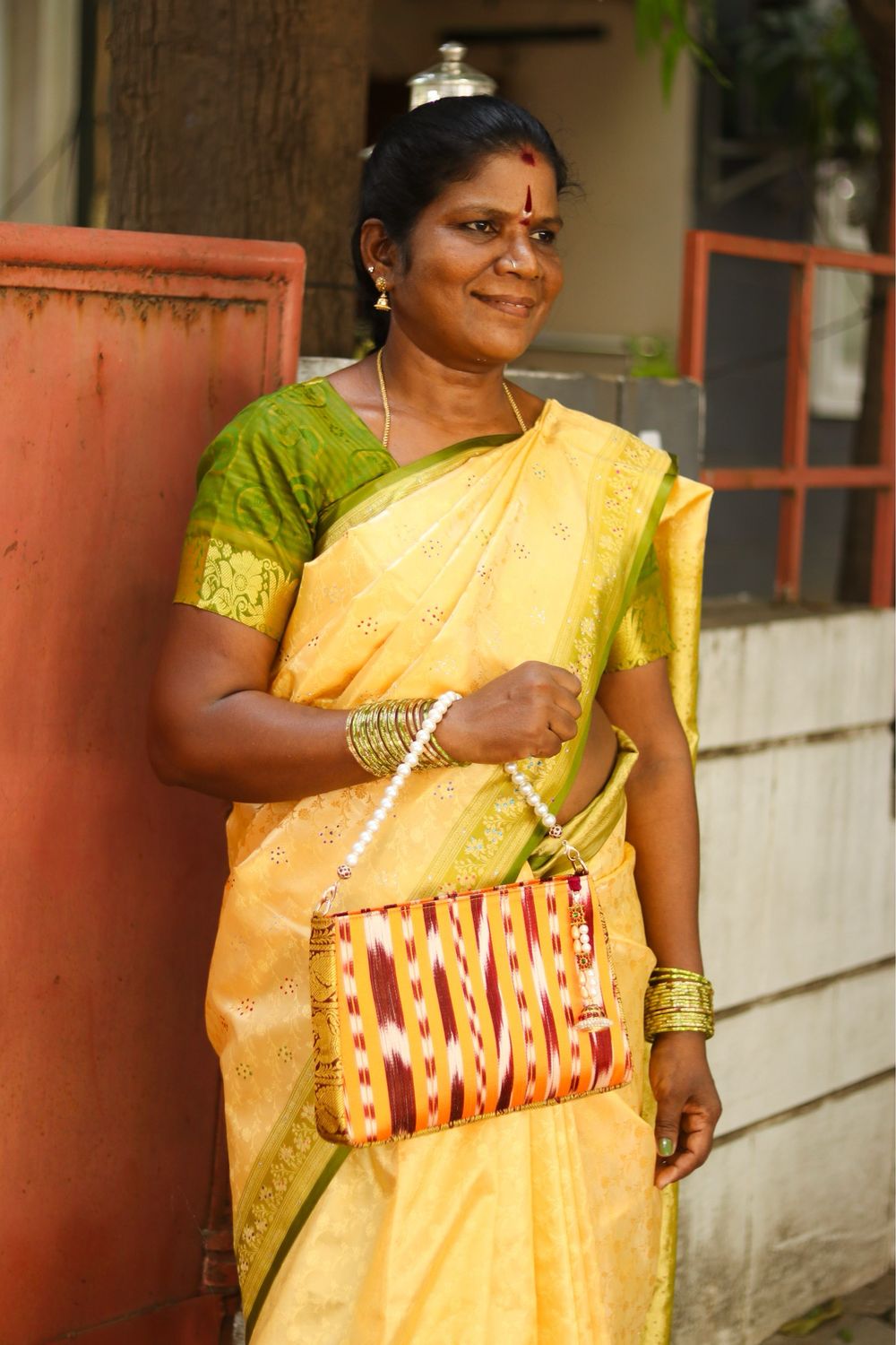 Kanakambara Handbag