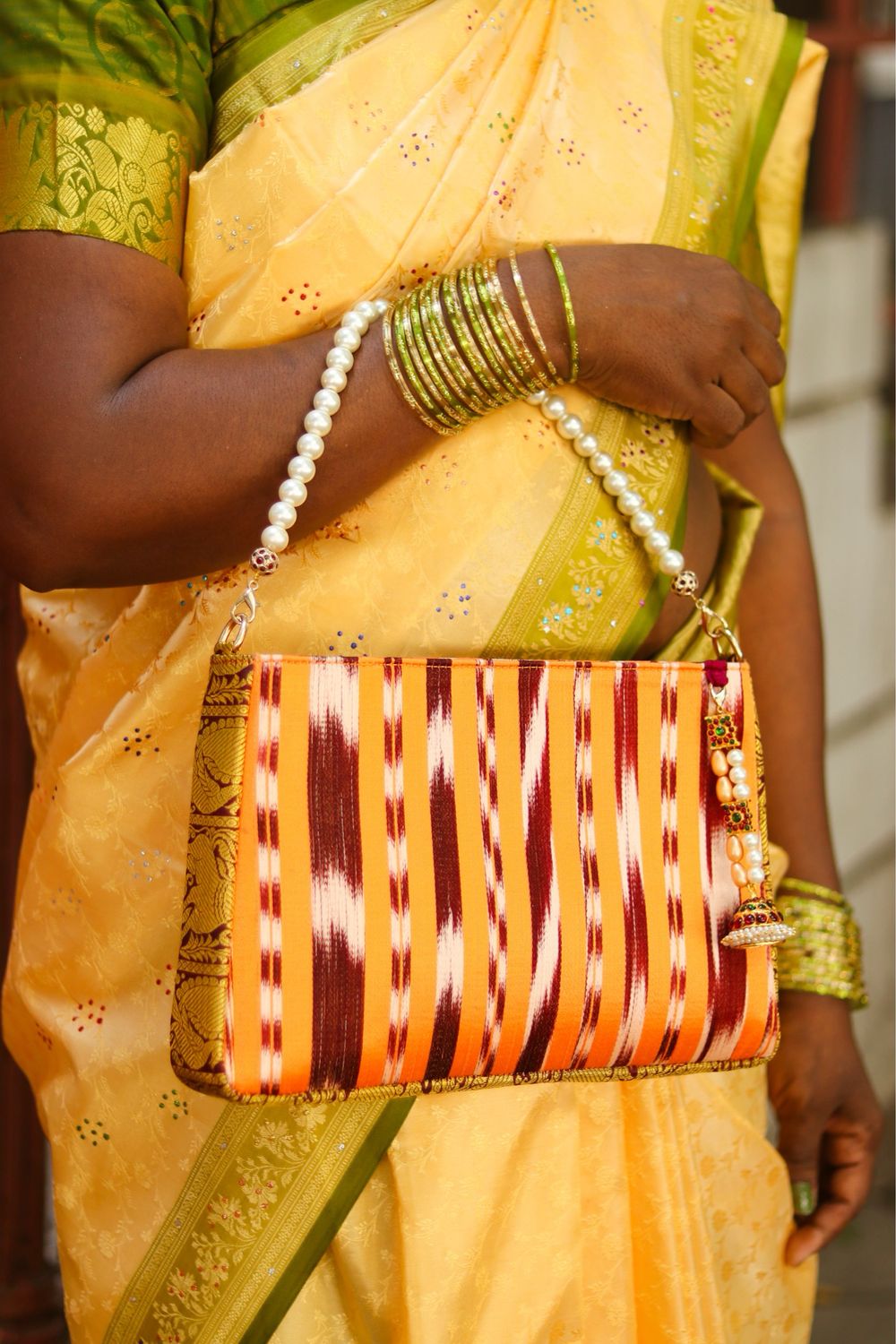 Kanakambara Handbag
