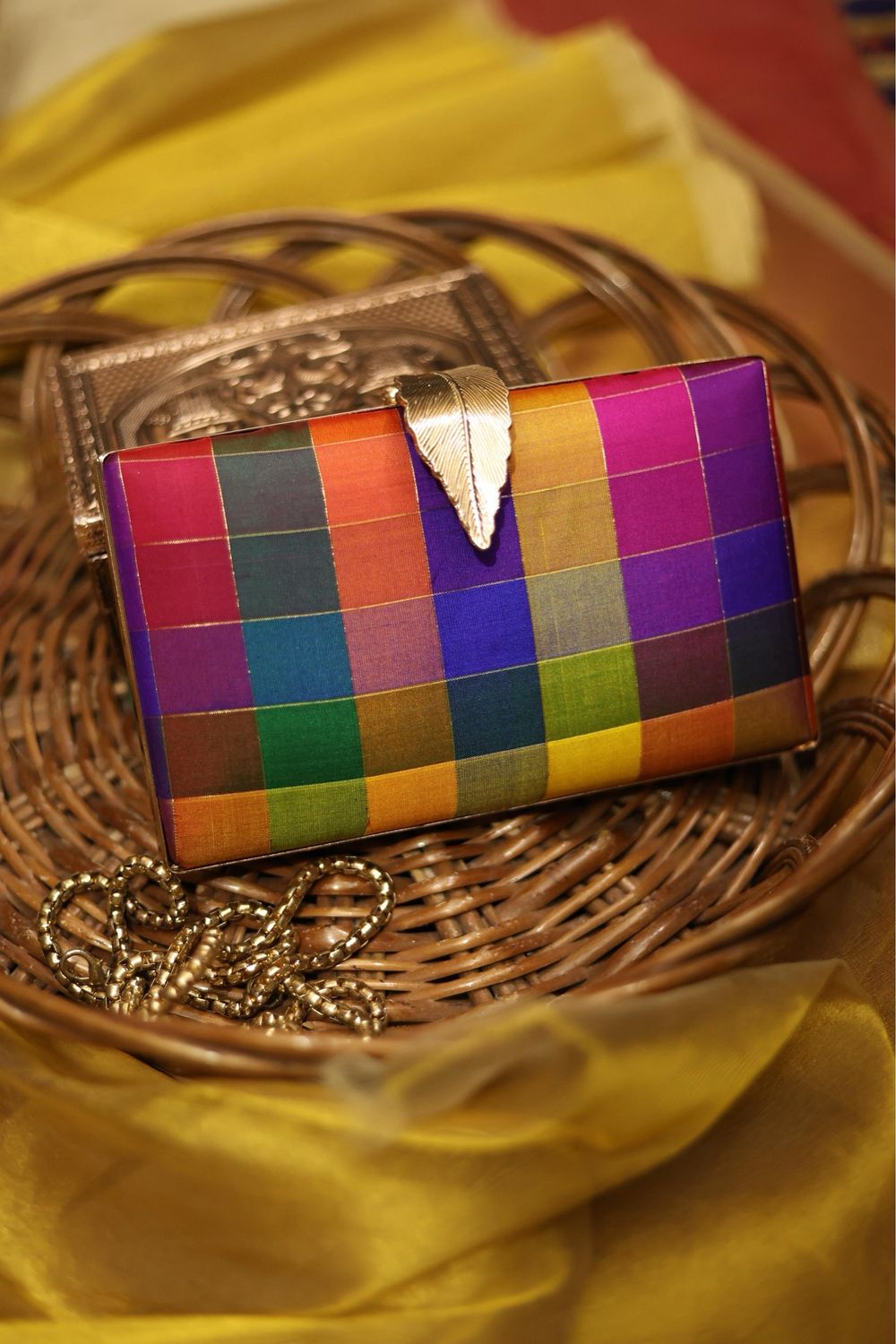 Varnajalam Feather Clutch