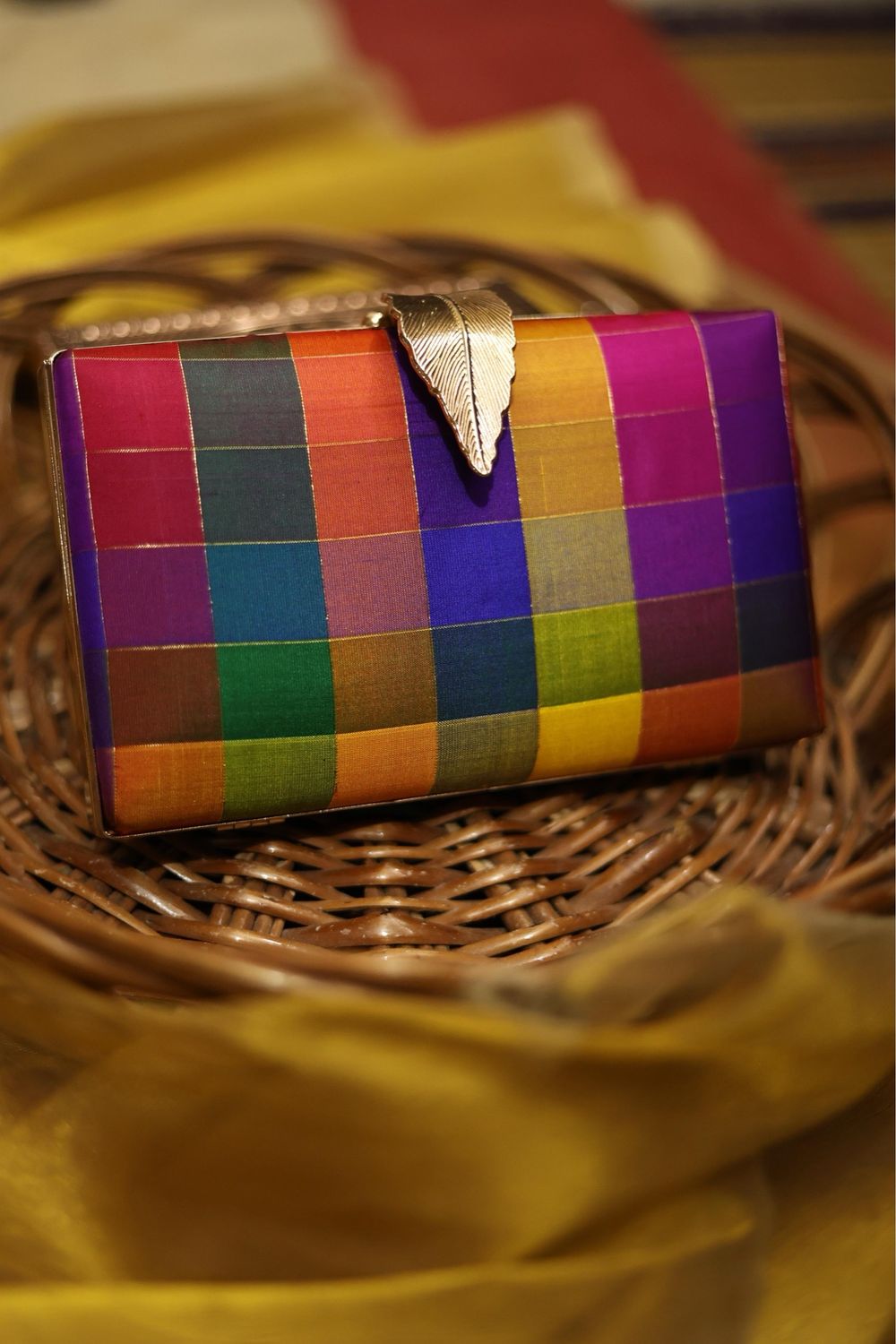 Varnajalam Feather Clutch